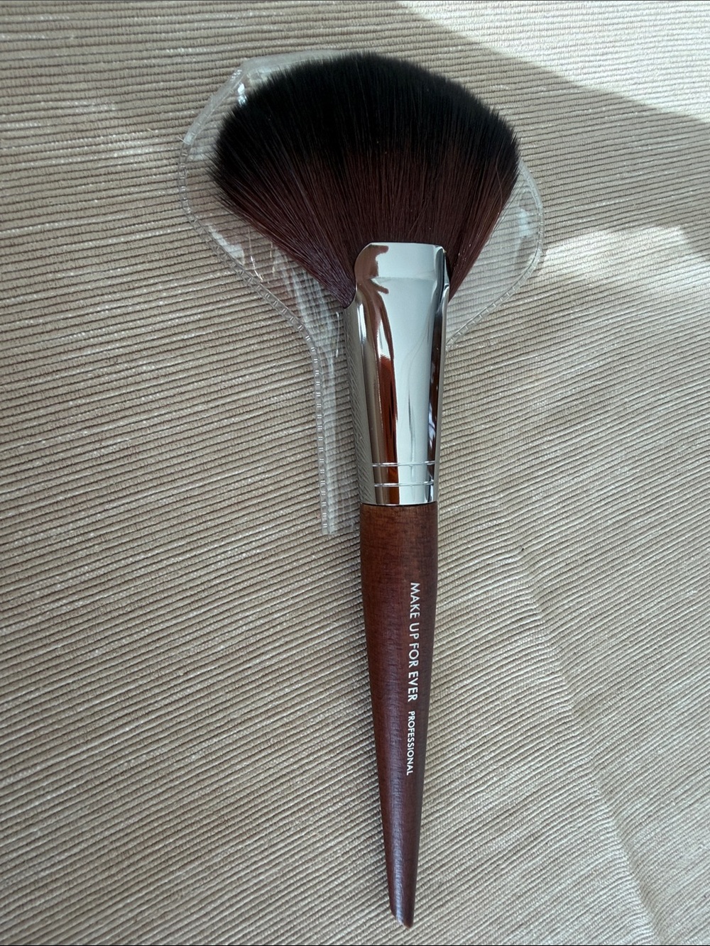 Makeup Forever Fan Brush with Brown Handle and Dark Bristles